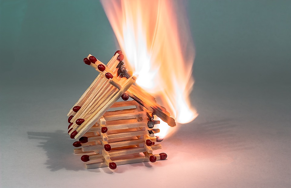 Match stick house on fire